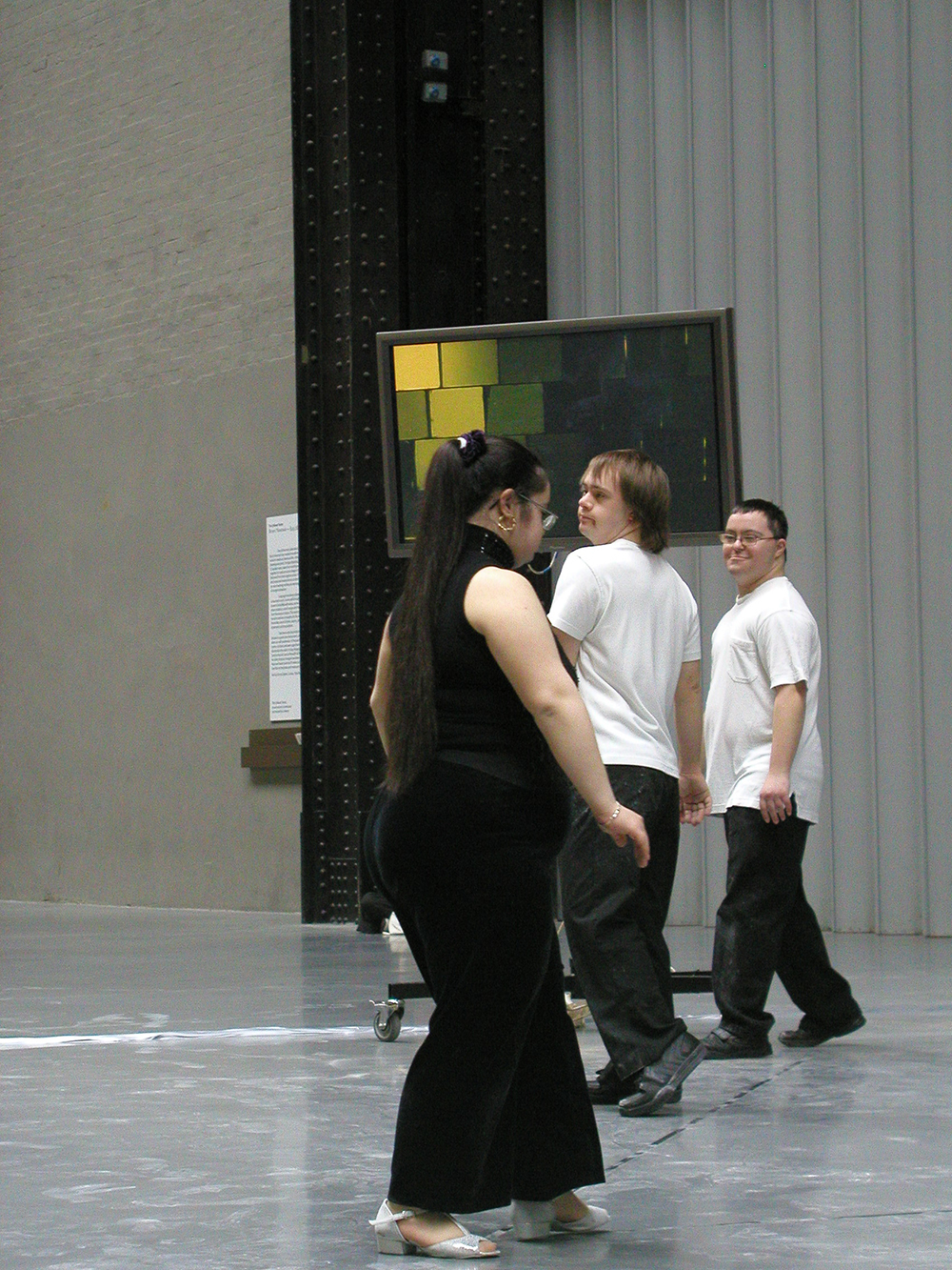 Photo of Aisha on the Gantry Bridge, Tate Modern dancing with 2 other dancers